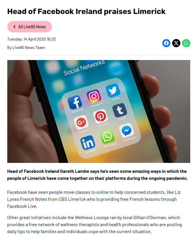 Person holding a smartphone displaying various social media apps, illustrating online connectivity in Limerick, Ireland.